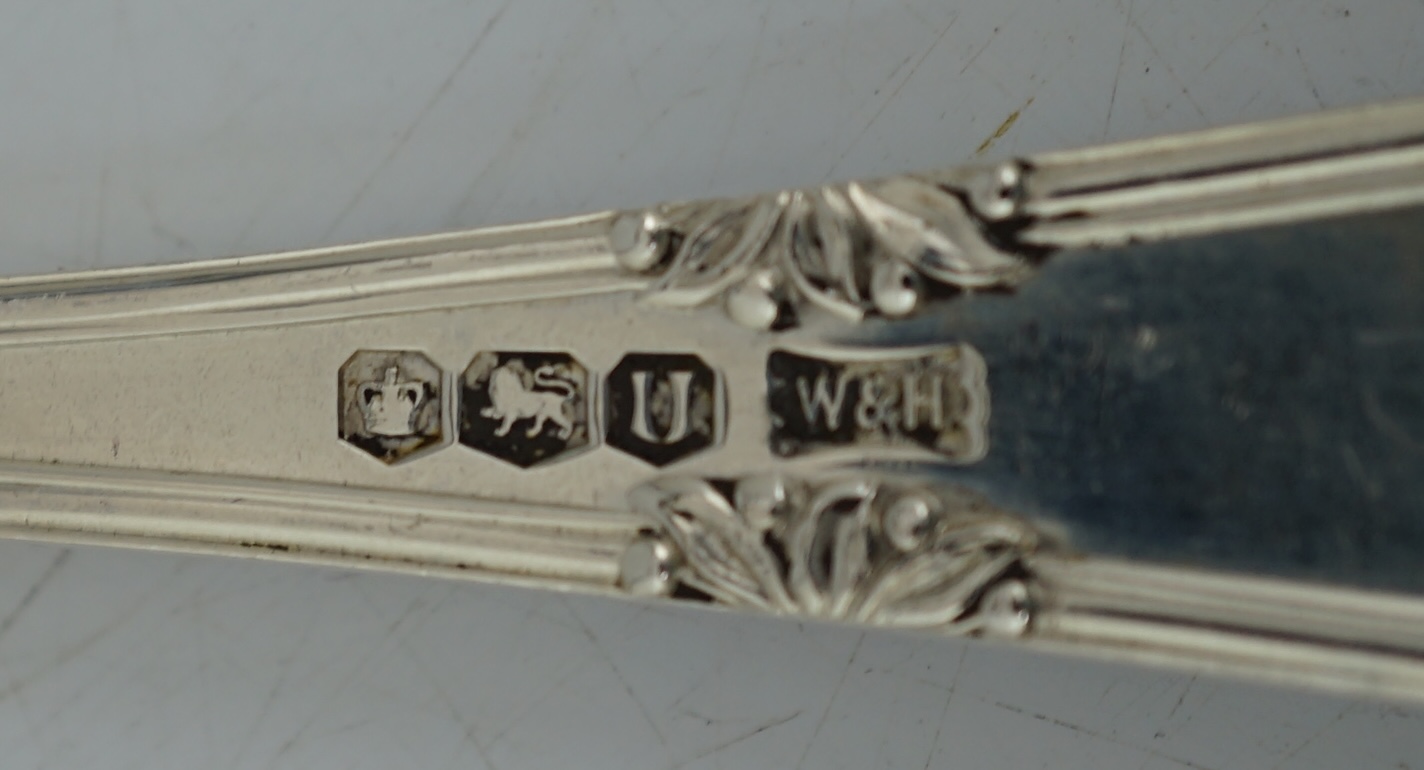 An Elizabeth II canteen of silver cutlery for six, by Walker & Hall